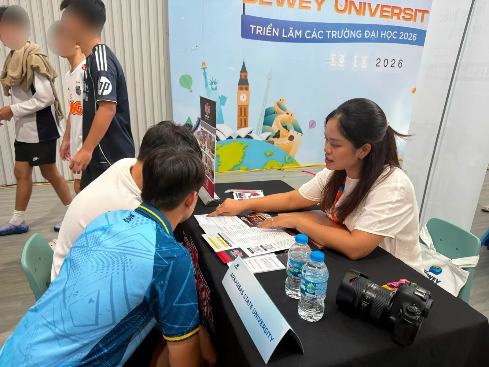 Advising at the A-State table, Dewey University Fair 2026, The Dewey Schools Tay Ho Tay campus