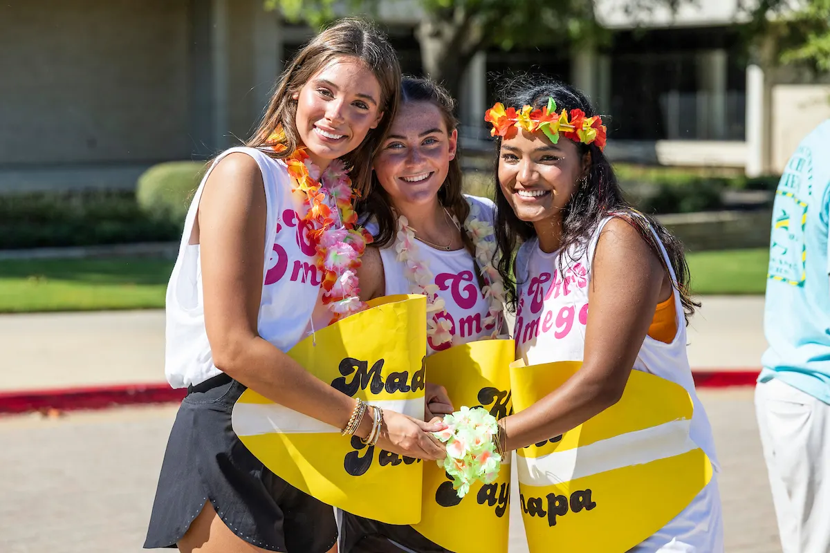 Sorority members celebrating together on Greek life bid day