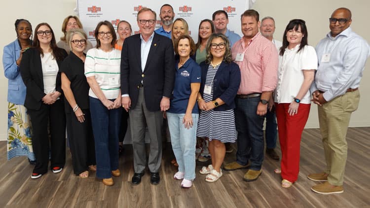 The 2026 class of the Northeast Arkansas Regional Leadership Accelerator Academy meeting Arkansas Highway Commissioner Jerry Halsey